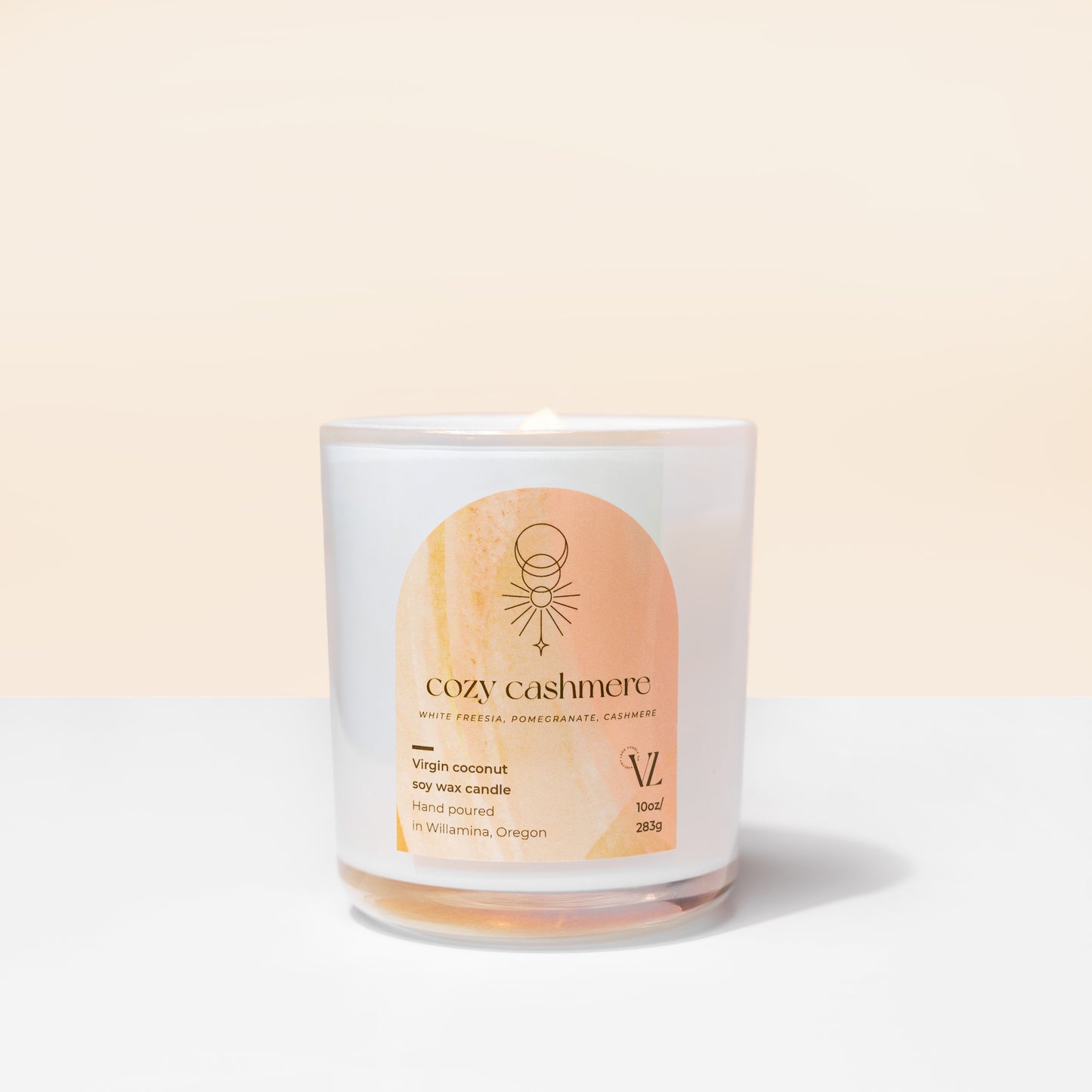 Cozy cashmere coconut soy wax candle | white freesia, pomegranate, cashmere